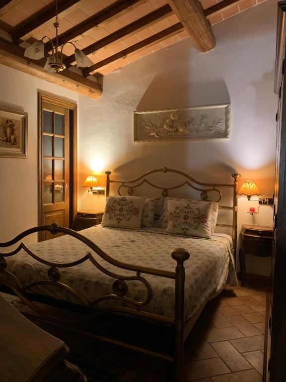 Кровать или кровати в номере Affitta camere Calderaro