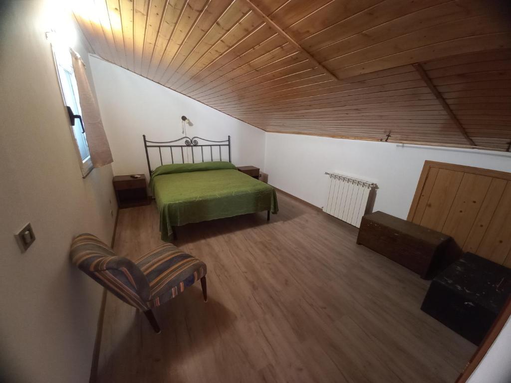 Postel nebo postele na pokoji v ubytování BB Cesarò Mariolo house