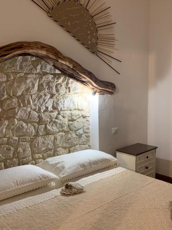 Postel nebo postele na pokoji v ubytování B&B Steddueoro