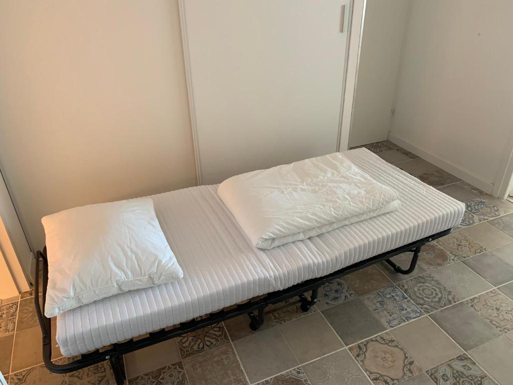 Postel nebo postele na pokoji v ubytování Apartment Vue Mer