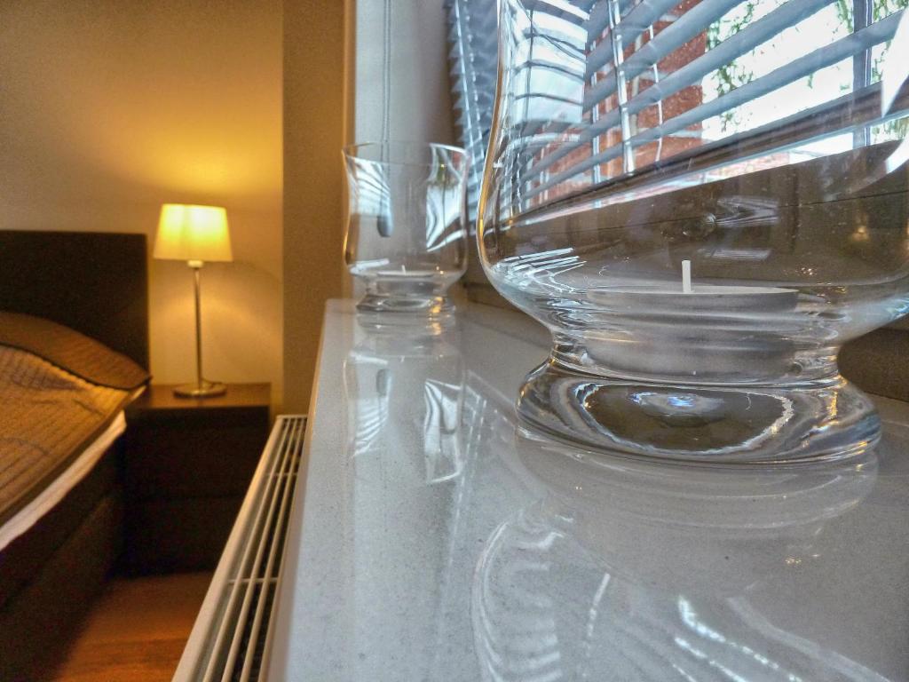 Posteľ alebo postele v izbe v ubytovaní Tartaczna Deluxe Apartments Gdansk