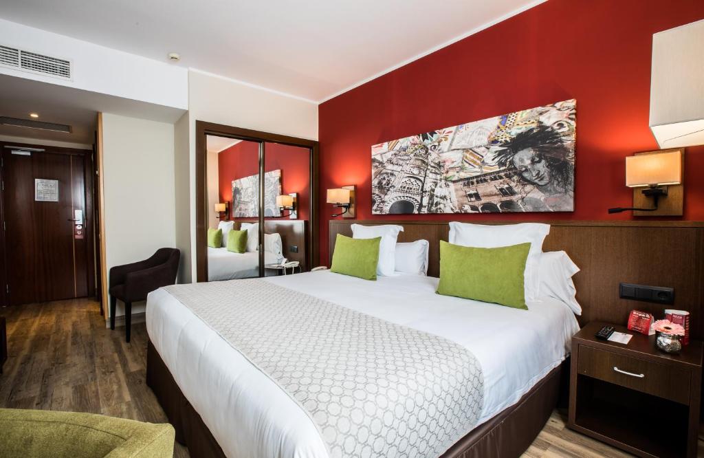Posteľ alebo postele v izbe v ubytovaní Leonardo Hotel Barcelona Gran Via