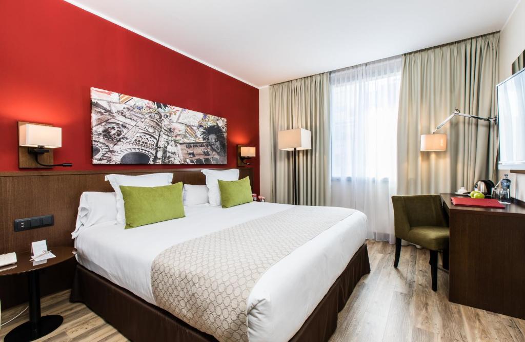Posteľ alebo postele v izbe v ubytovaní Leonardo Hotel Barcelona Gran Via