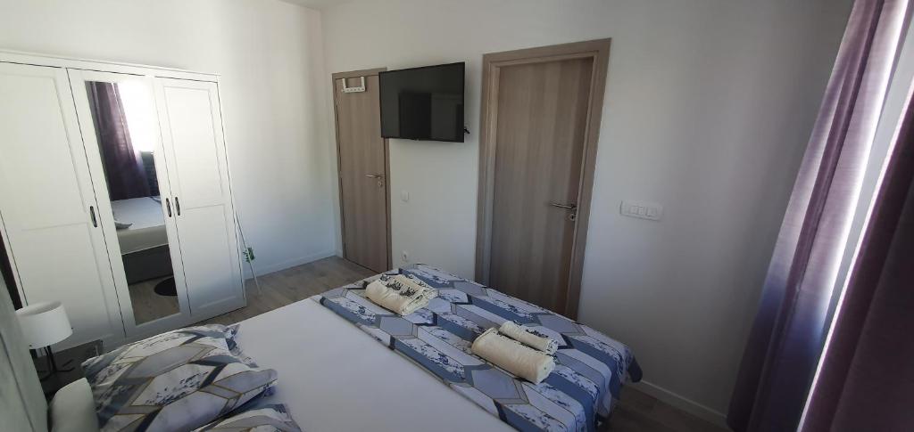 Postel nebo postele na pokoji v ubytování Apartments Ena