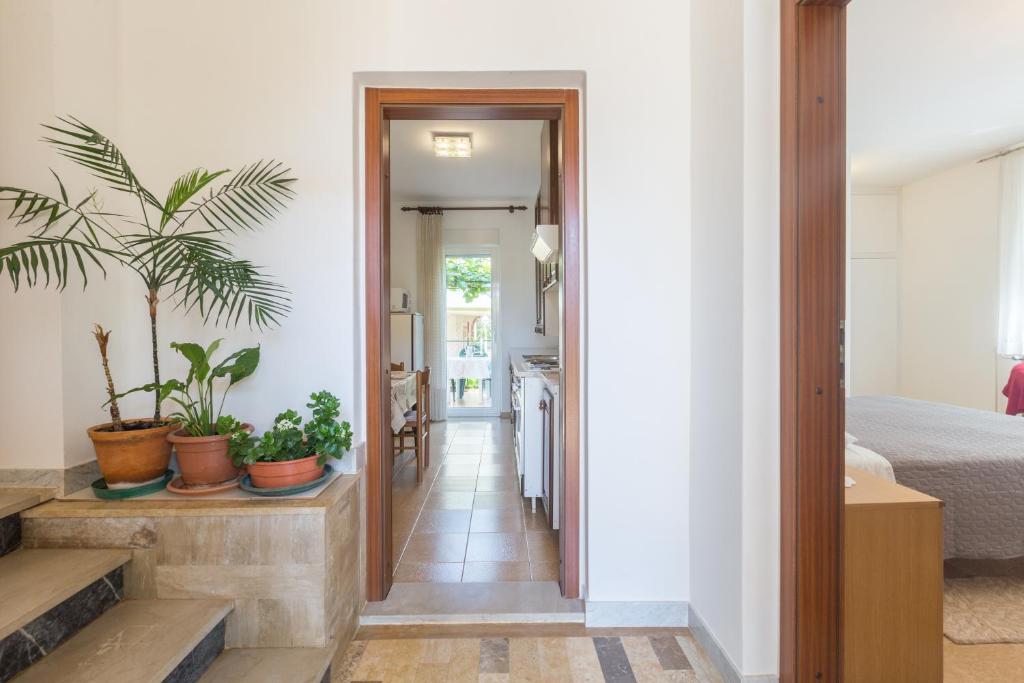 Postel nebo postele na pokoji v ubytování Apartment Umag 7063b