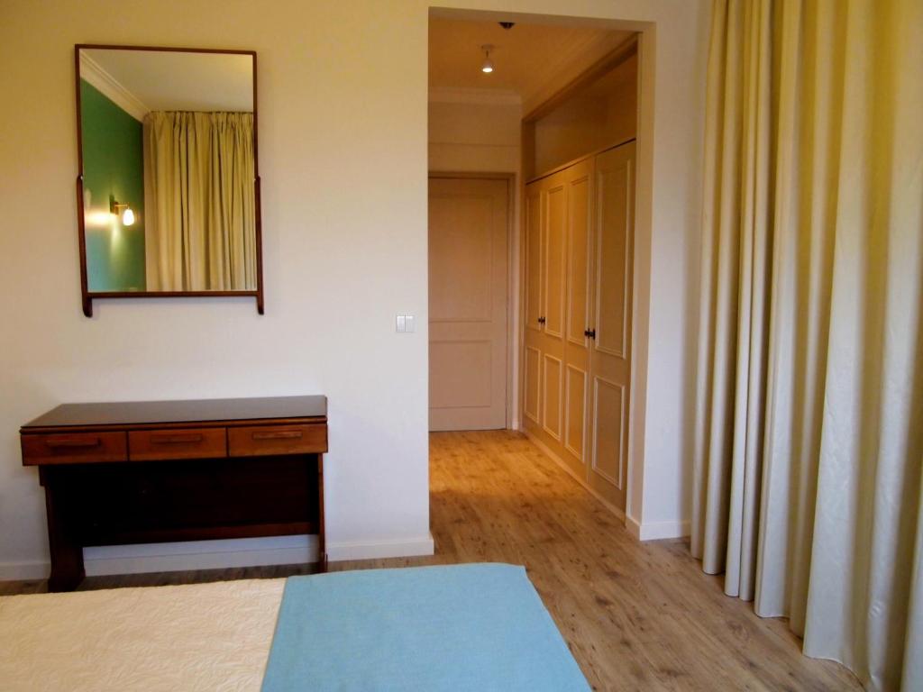 Postel nebo postele na pokoji v ubytování Hotel Areias Claras