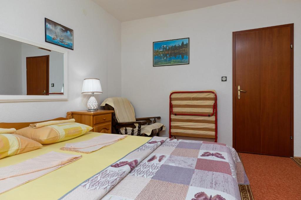 Posteľ alebo postele v izbe v ubytovaní Apartment Pisak 15177b