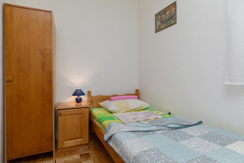 Posteľ alebo postele v izbe v ubytovaní Apartment Pisak 15177b