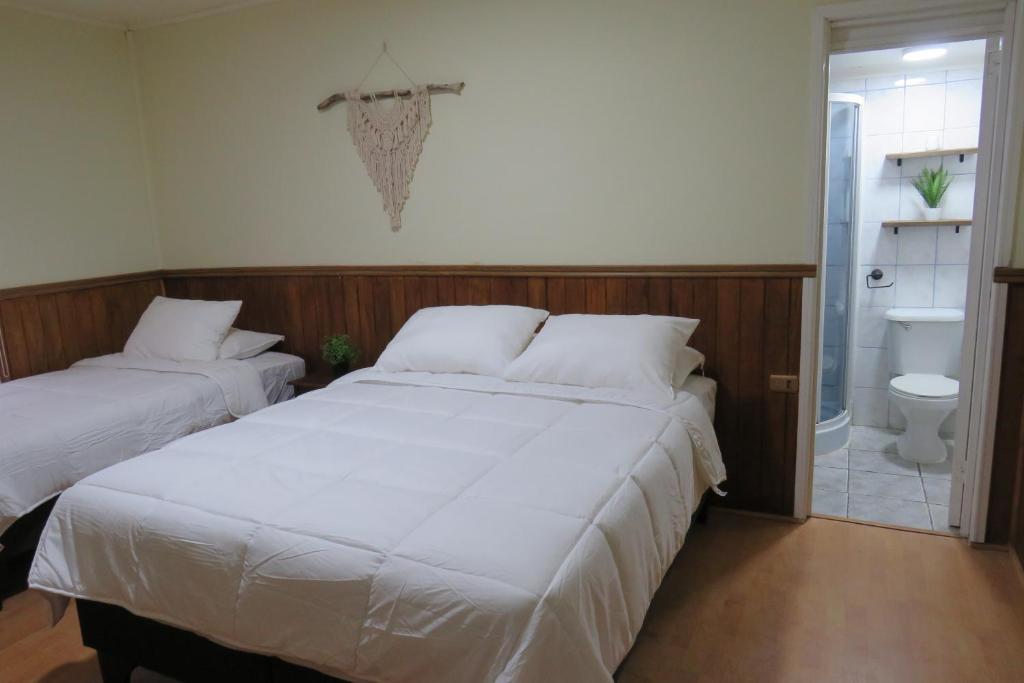 Voodi või voodid majutusasutuse Riverline lodge toas