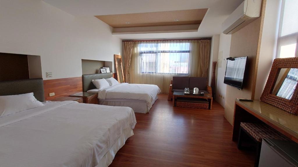 Postel nebo postele na pokoji v ubytování Corner Hostel