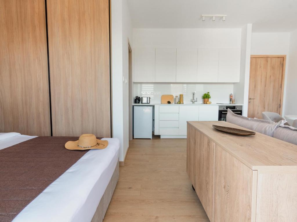 Kuchyň nebo kuchyňský kout v ubytování Armonta Residences by BeCyprus