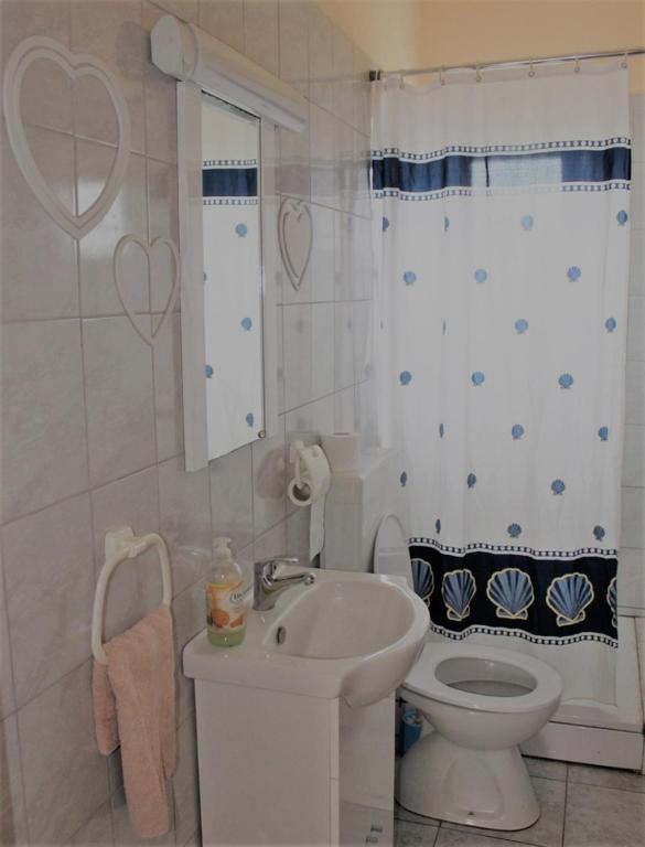 Koupelna v ubytování Apartments by the sea Lun, Pag - 9395