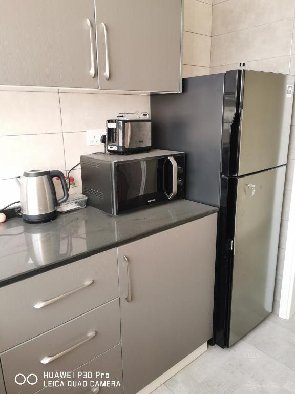 Kuchyň nebo kuchyňský kout v ubytování Amazing 2BR pent house flat with mountain view