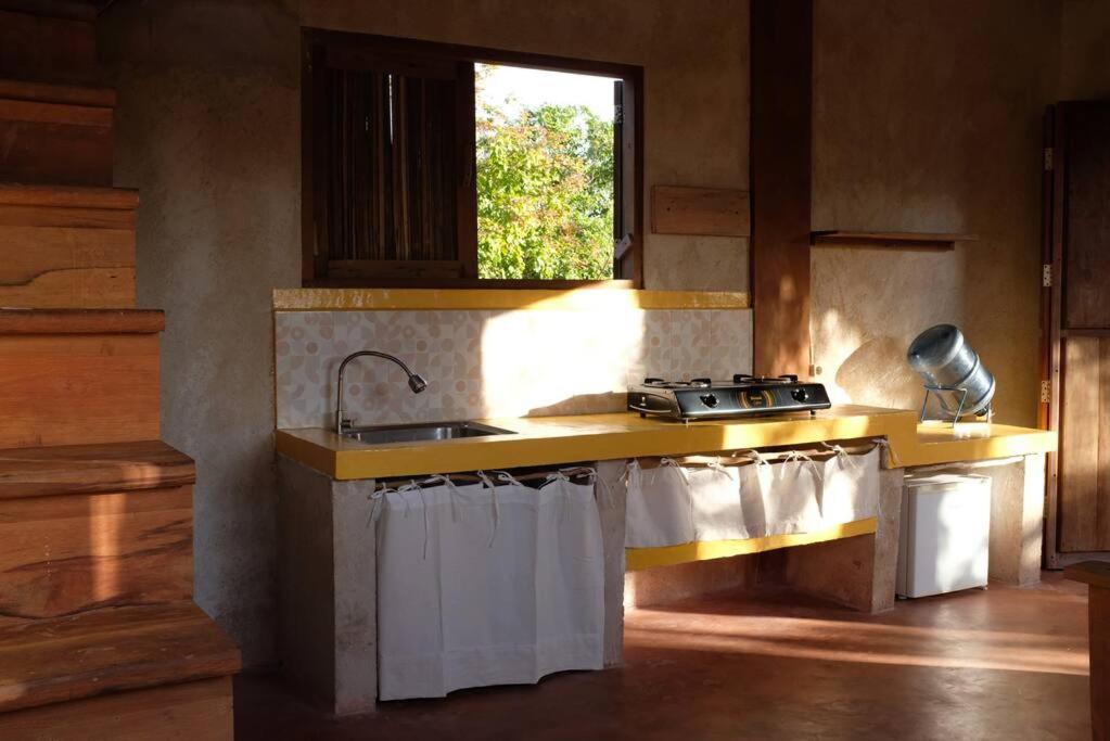 Kuchyň nebo kuchyňský kout v ubytování Rumah Tinggi at Pachamama