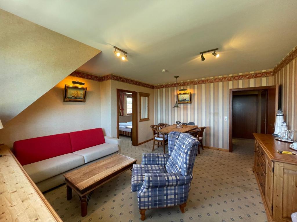 Posezení v ubytování Moby Dick Hotel & Ferienwohnungen