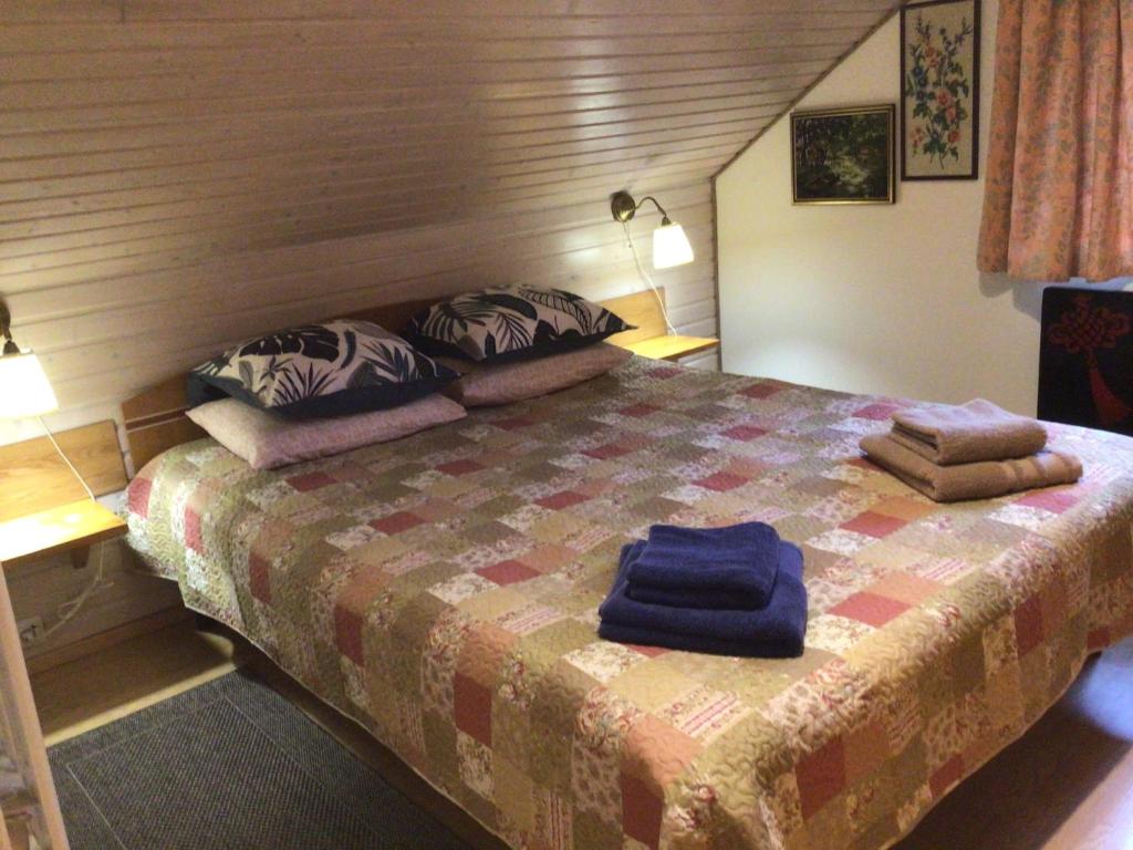 En eller flere senge i et værelse på Рукавичка