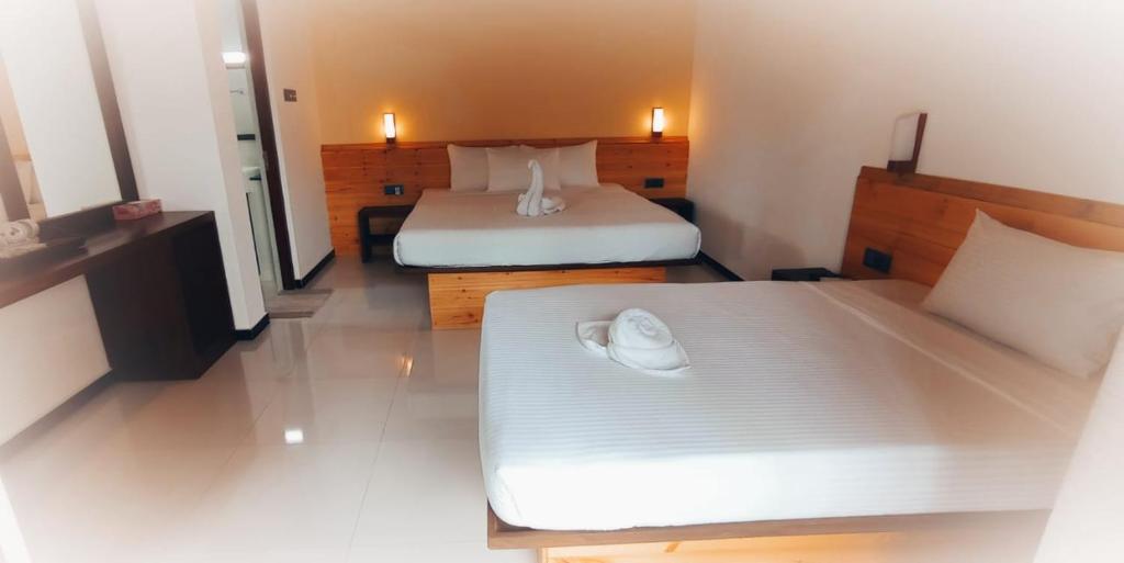 Postel nebo postele na pokoji v ubytování Hotel Bella Vista