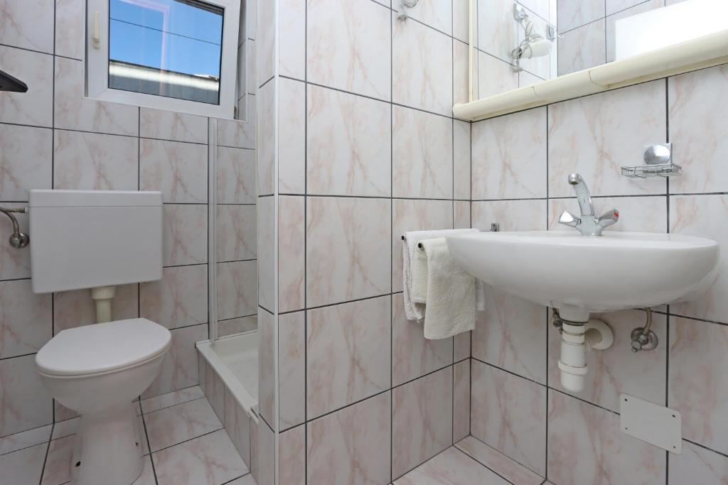 Kúpeľňa v ubytovaní Apartments with a parking space Crikvenica - 12592