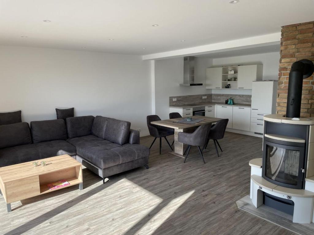 Kuchyň nebo kuchyňský kout v ubytování Meerzeit Ferienwohnung Fehmarn