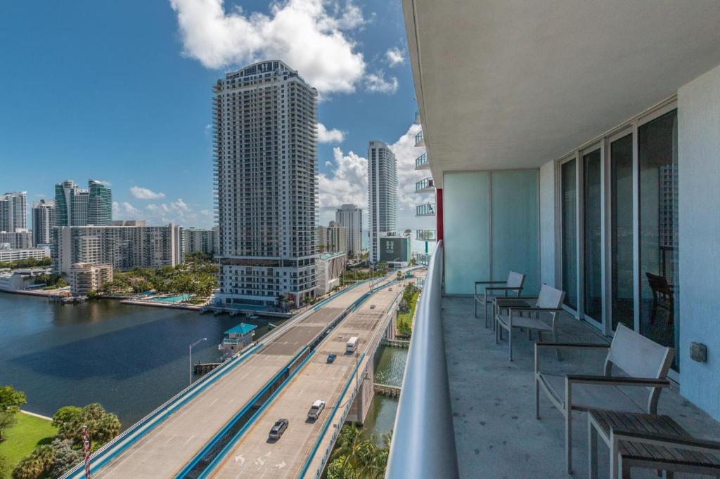 a balcony of a building with a view of a city at Modern two bed Beach Walk Miami 15th in Hollywood