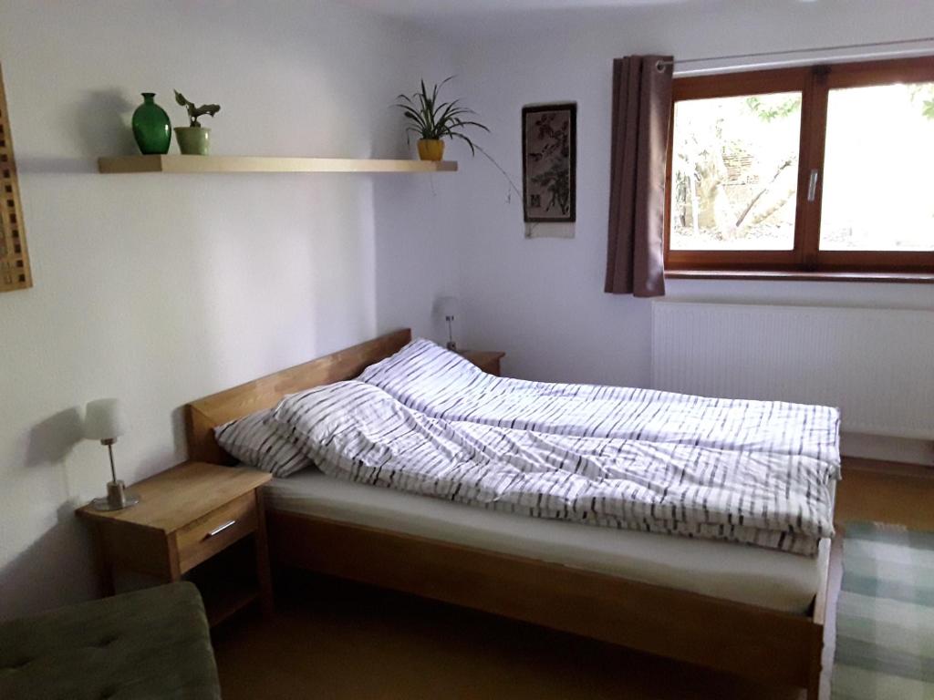 Säng eller sängar i ett rum på Apartment am Gifizsee Offenburg