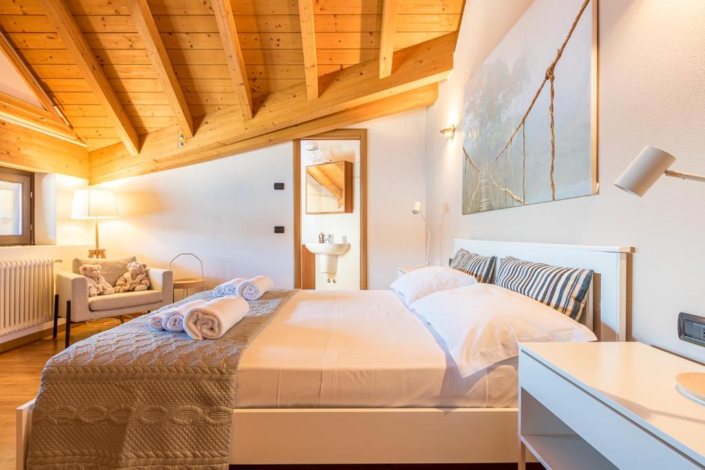 Posteľ alebo postele v izbe v ubytovaní Apartment Tamara Suite - Menaggio
