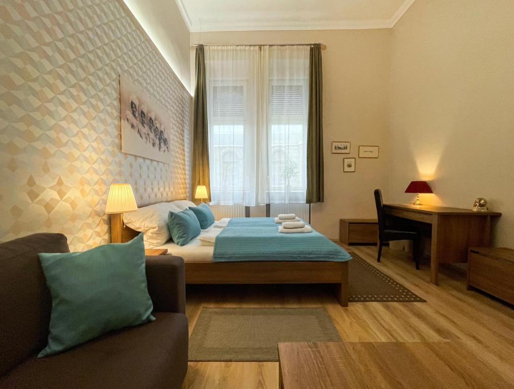 Posteľ alebo postele v izbe v ubytovaní ABT Apartments