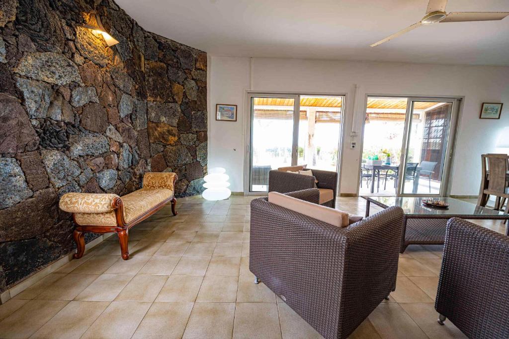 Posezení v ubytování Villa Coco des sables accès direct au lagon