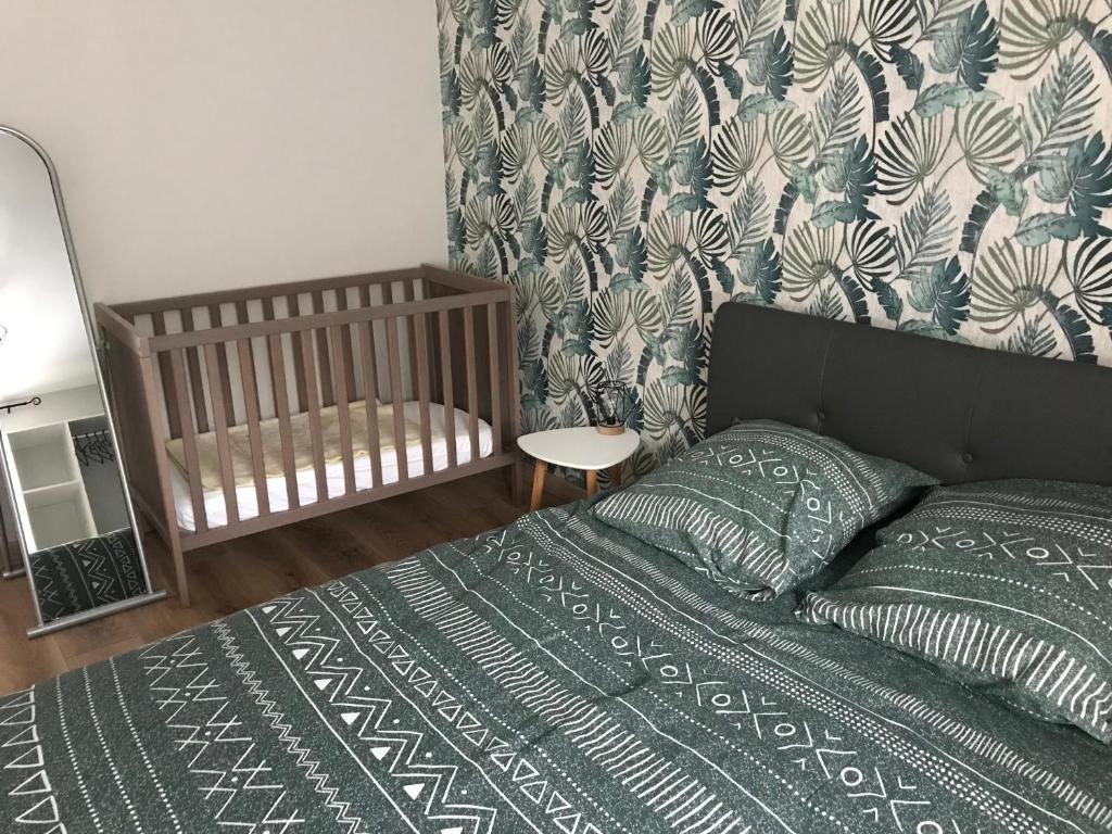 Postel nebo postele na pokoji v ubytování Gîte des falaises