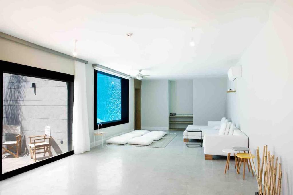A bed or beds in a room at Vistaport A - Luxury Villa