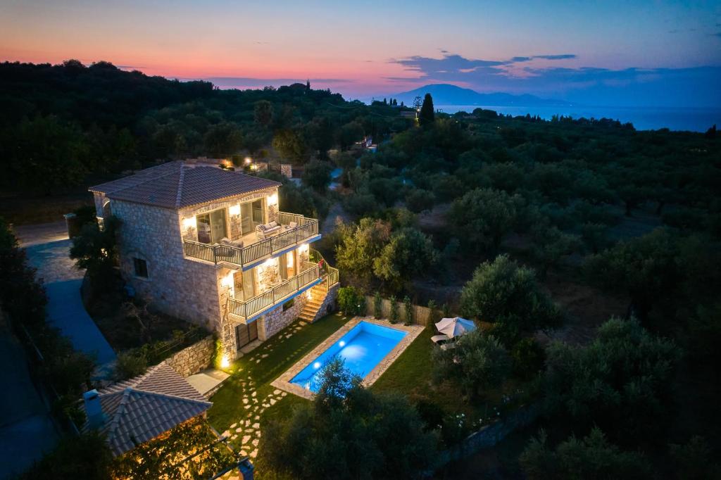 an aerial view of a house with a swimming pool at Neva Villa in Zakynthos Town