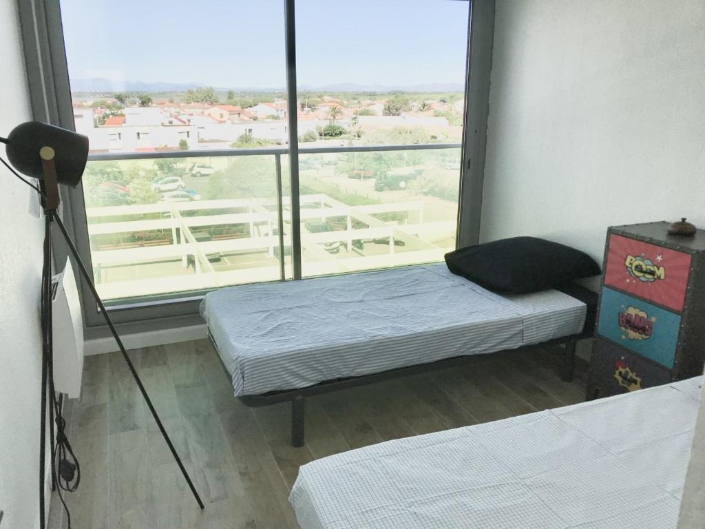 Posteľ alebo postele v izbe v ubytovaní Appartement face à la mer - 6 à 8 personnes - Canet en Roussillon