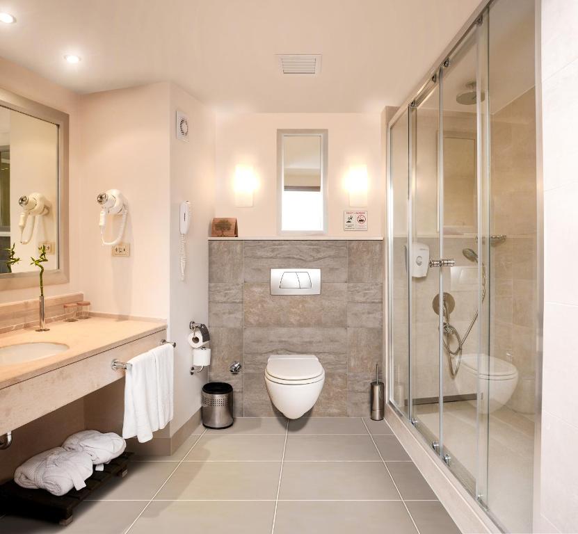 Koupelna v ubytování Korumar Hotel Deluxe