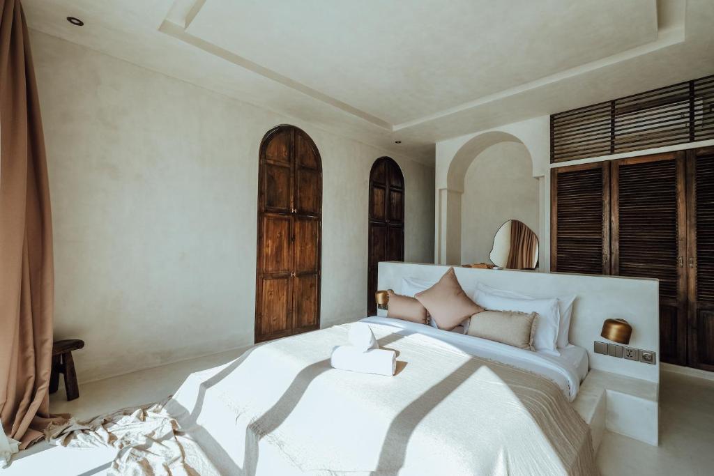 Postel nebo postele na pokoji v ubytování Casa Viamo