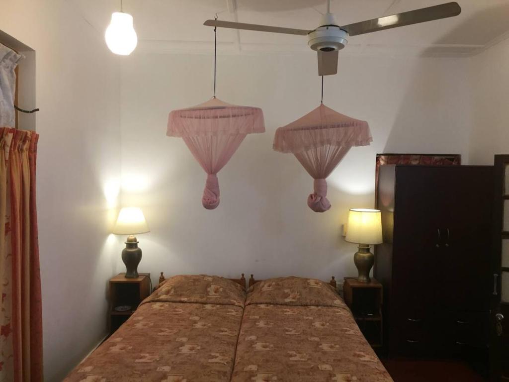 Postel nebo postele na pokoji v ubytování Hotel Shalini