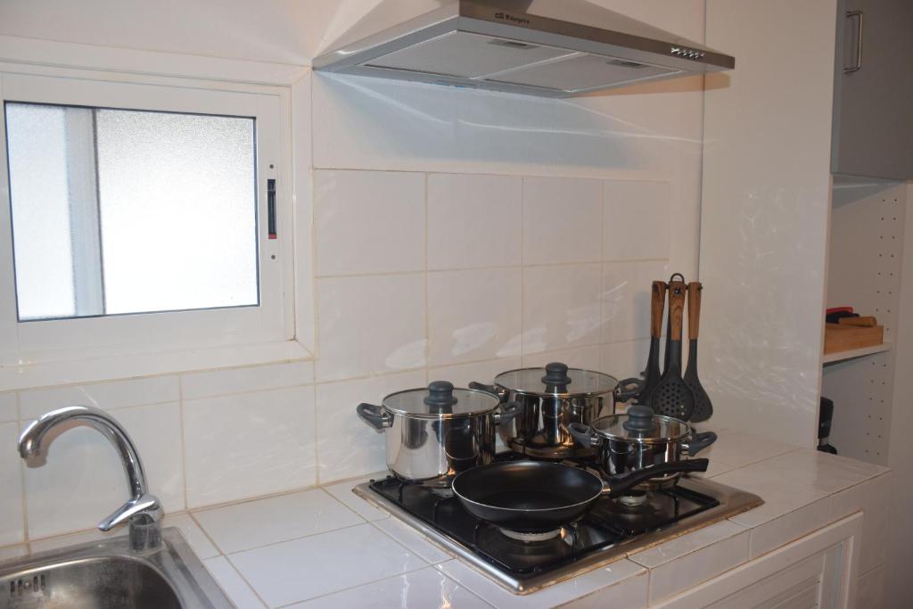 A kitchen or kitchenette at Garoé Acogedor Apartamento