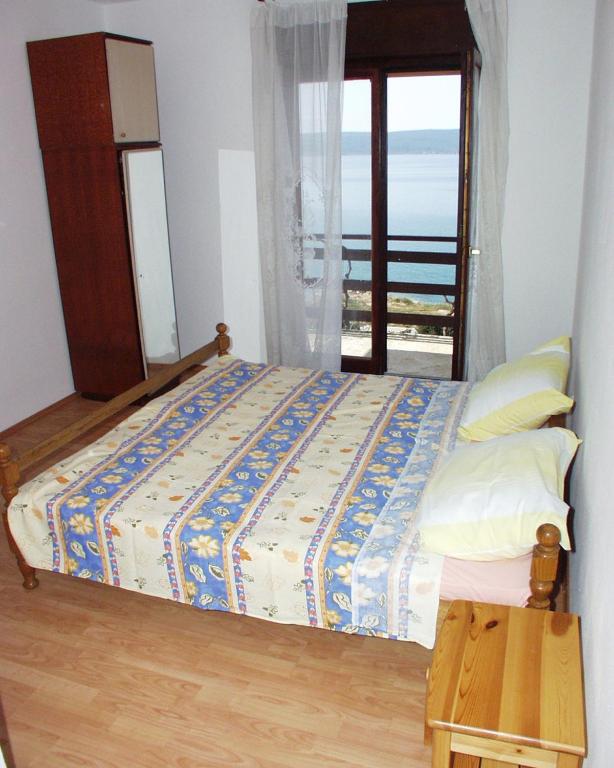 Postel nebo postele na pokoji v ubytování Apartments by the sea Sveti Petar, Biograd - 358