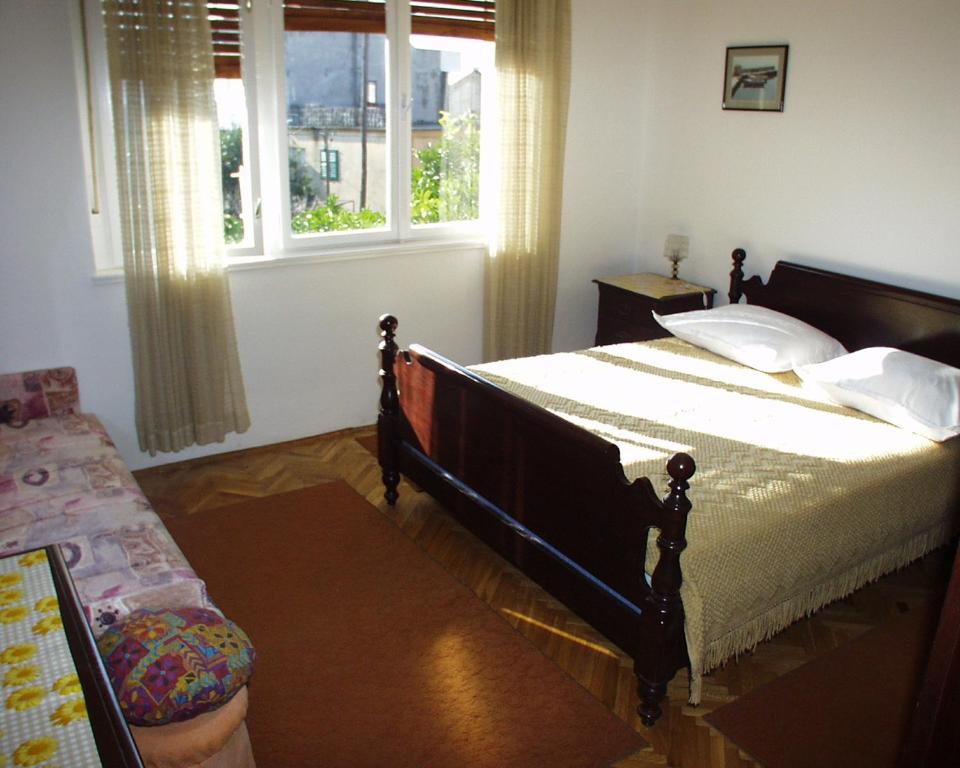 Posteľ alebo postele v izbe v ubytovaní Apartments by the sea Podgora, Makarska - 316