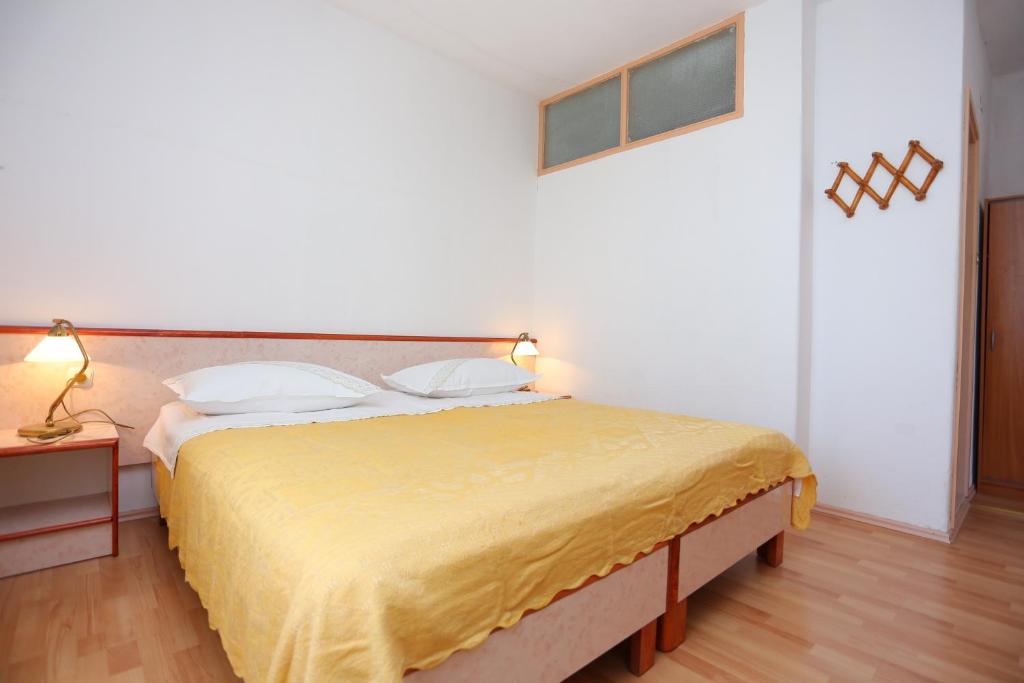 Posteľ alebo postele v izbe v ubytovaní Apartment Igrane 311b