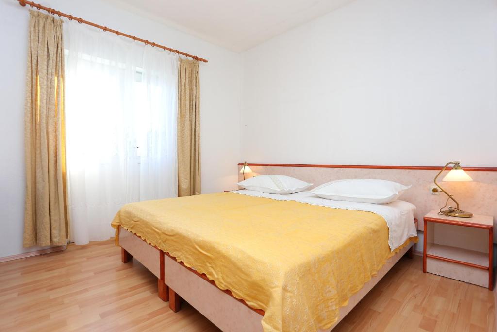 Posteľ alebo postele v izbe v ubytovaní Apartment Igrane 311b