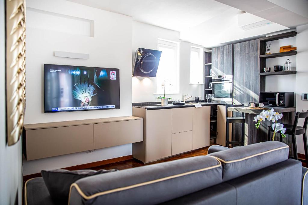 Televízia a/alebo spoločenská miestnosť v ubytovaní Luxury Top Floor in Trastevere