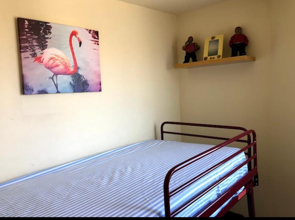 Postel nebo postele na pokoji v ubytování Las tres palmeras