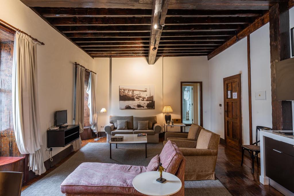 Posezení v ubytování Isla Baja Suites
