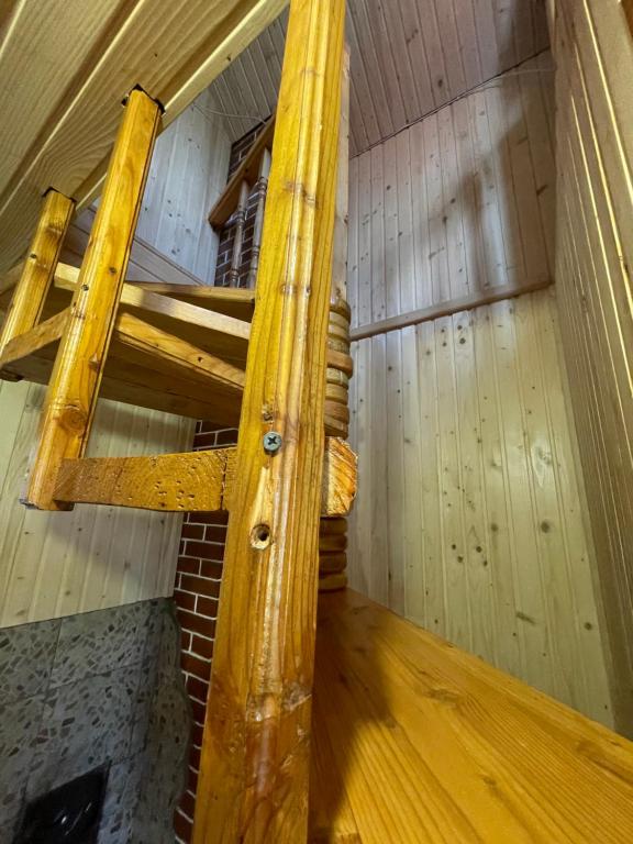 Palanda nebo palandy na pokoji v ubytování Mini Cottage