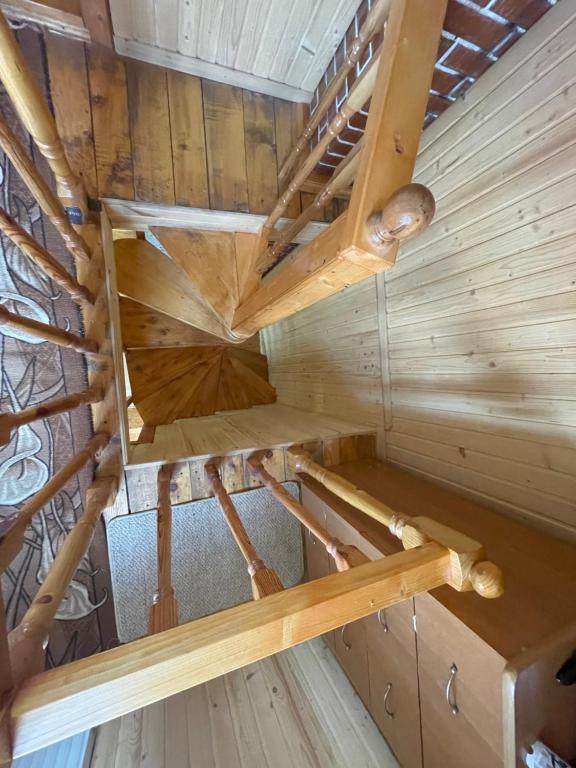Palanda nebo palandy na pokoji v ubytování Mini Cottage