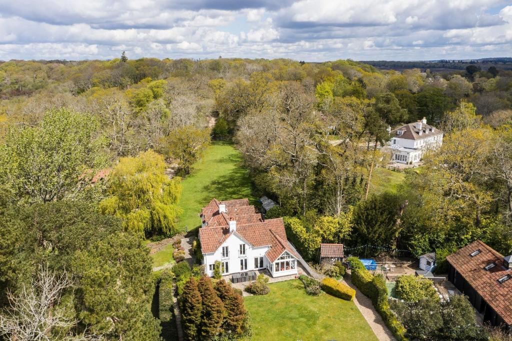 an aerial view of a house with a yard at Broombank in Burley