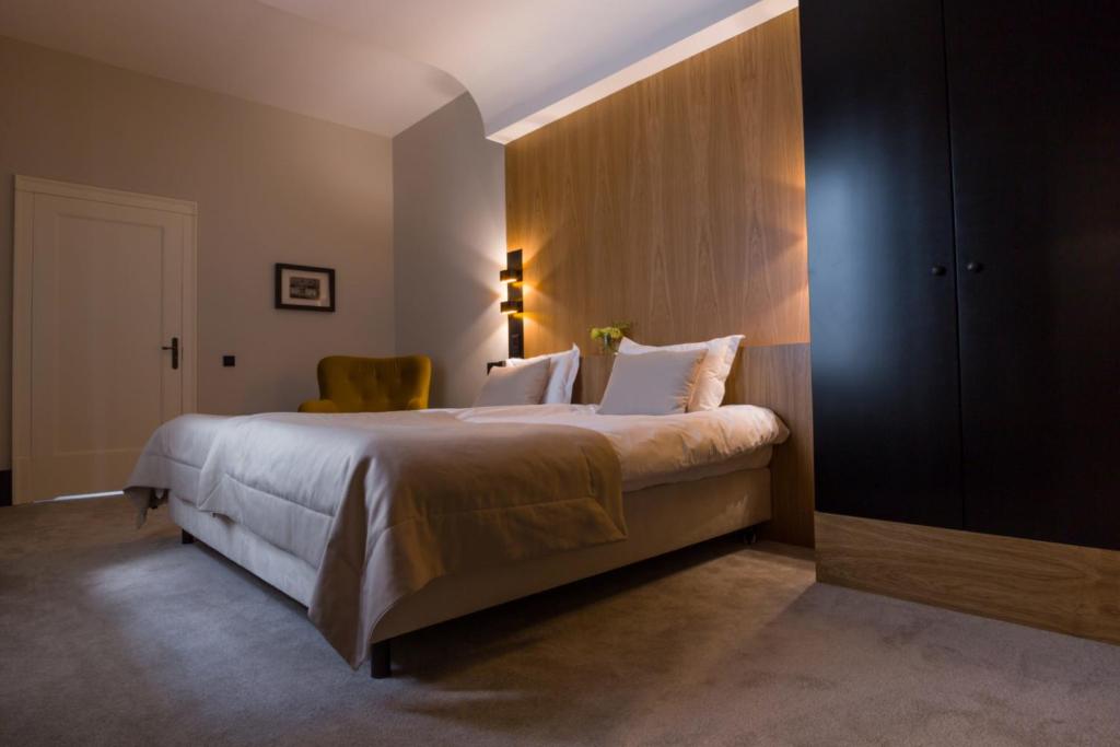 Postel nebo postele na pokoji v ubytování Hotel Nihil Novi