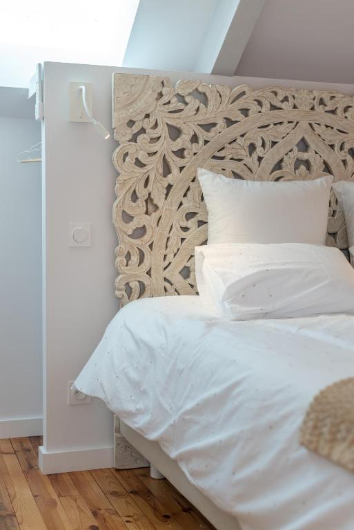 Posteľ alebo postele v izbe v ubytovaní Le Grenier Cosy, T2 classé meublé de tourisme
