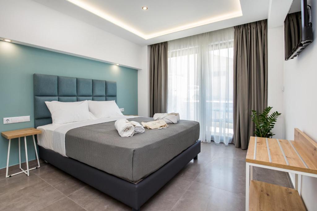 Postel nebo postele na pokoji v ubytování New Azzurro Deluxe