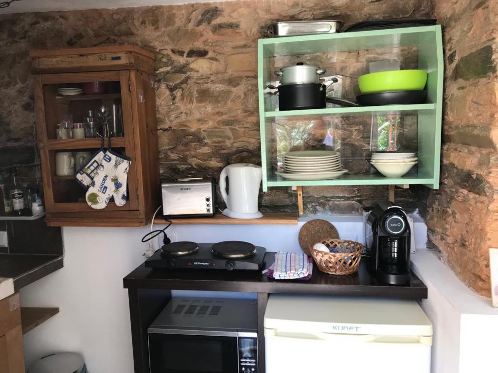 Kuchyň nebo kuchyňský kout v ubytování Casas do Sinhel